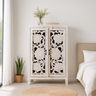 Lifestyle imagination of a white washed mango wood cabinet with three compartments and hand‑carved floral doors, vintage style, 75 × 40 × 120 cm.