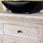 Close up image of a handcrafted wooden carved sideboard with oriental arches and whitewashed finish; perfect as an entryway table vintage feature, 160 × 80 × 40 cm.