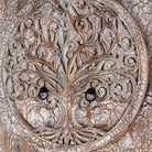 Close up image of a vintage style wardrobe with Tree of Life design, hand-carved mango wood furniture with four storage compartments, 90 × 40 × 180 cm.