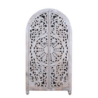 White background image of a Bhuvana arched mango wood wardrobe featuring a sculptural half-round design, intricate hand-carved floral detailing, and carved legs—an artisanal piece in the collection of arched wardrobes and mango wood wardrobes.