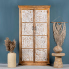 Mango wood wardrobe with whitewashed floral carvings, vintage furniture cabinet in carved wood, 190 × 105 × 42 cm.