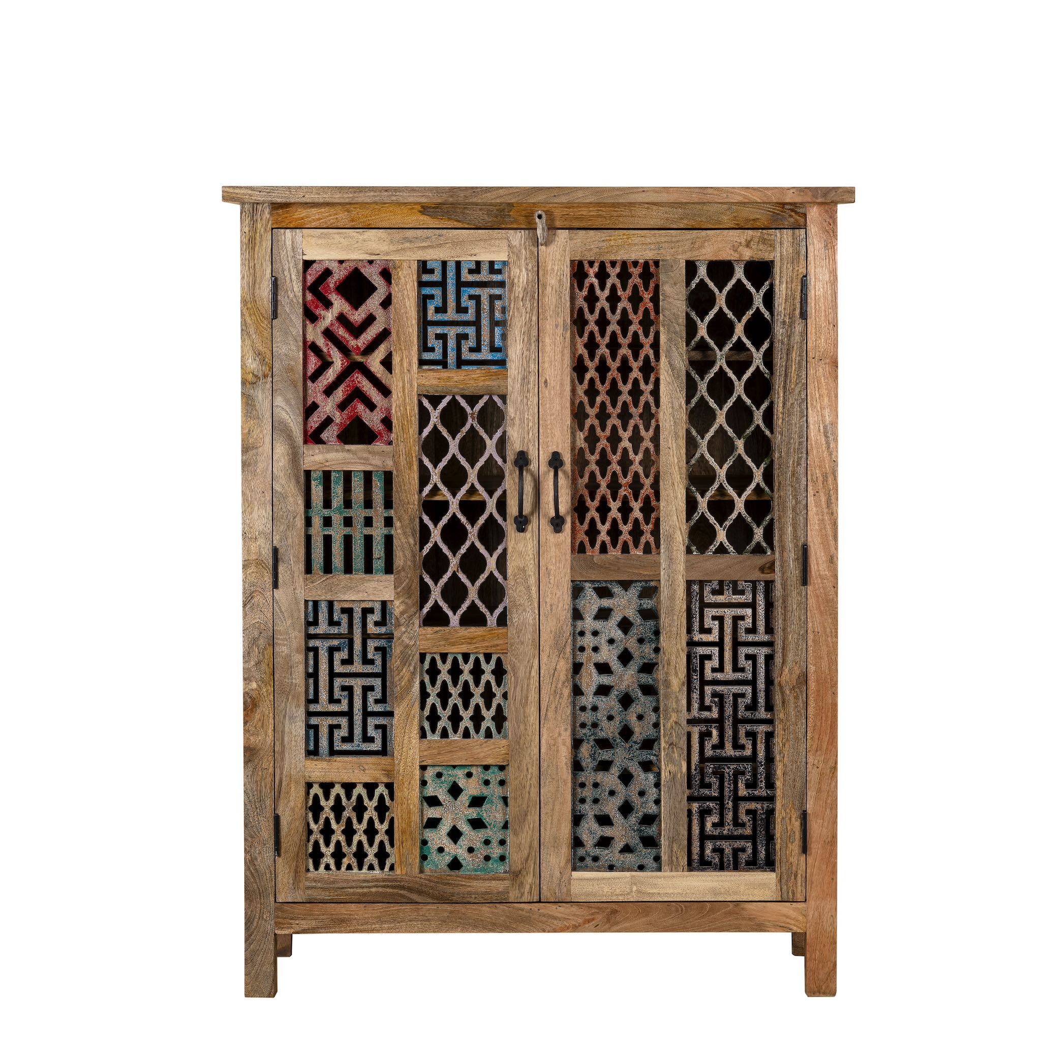 White background image of an artisan-made cabinet crafted from mango wood, featuring double doors adorned with a patchwork of colourful, intricately carved geometric panels, blending traditional craftsmanship with a vibrant, eclectic style.
