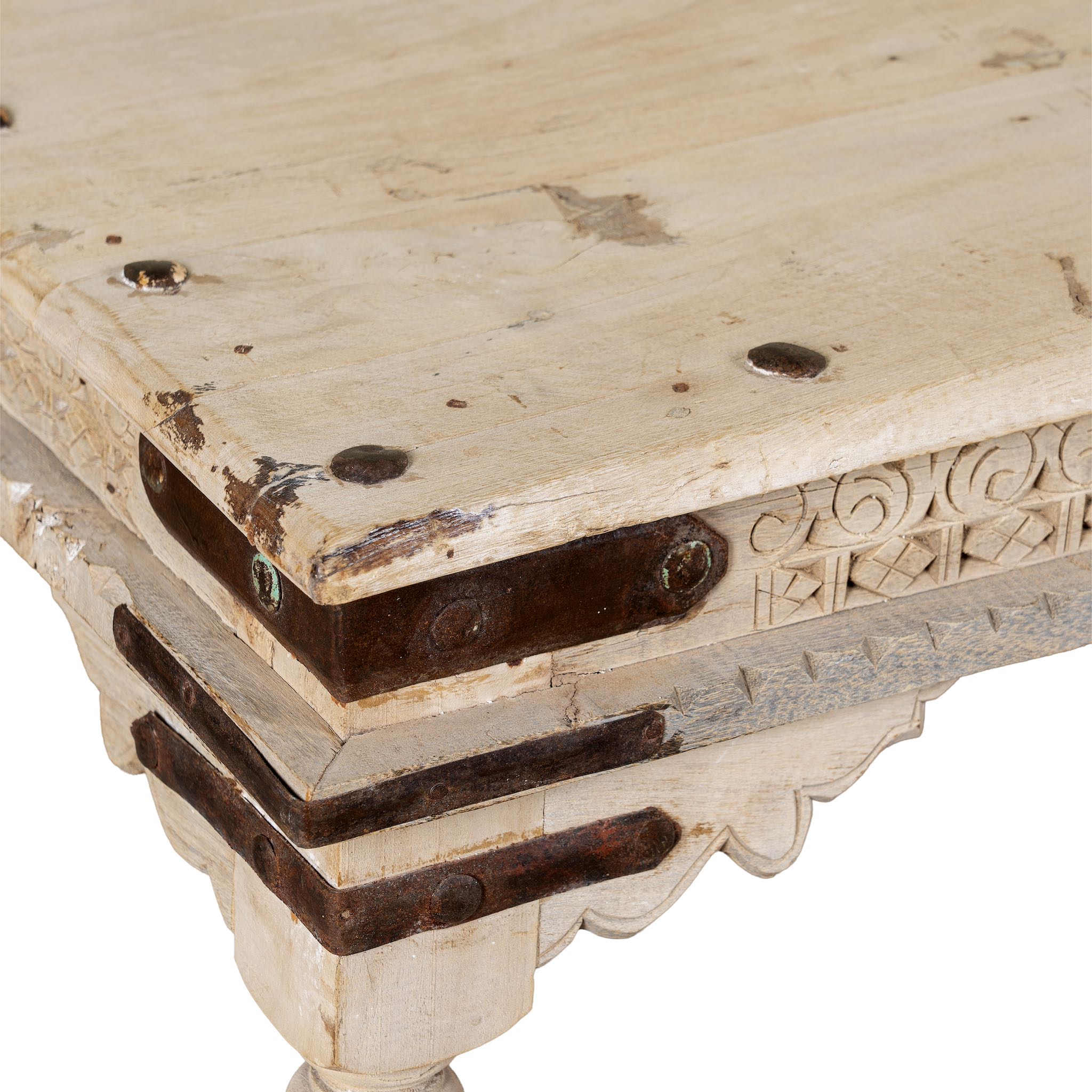 Close up image of  Ibiza style coffee table teak wood, reclaimed teak with carved details; sustainable Indian coffee table, 122 × 77 × 44 cm.