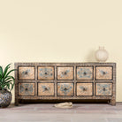 Hand painted mango wood chest of 10 drawers with elephant and floral motifs; hand painted furniture for a boho chic living room, 200 × 41 × 85 cm.