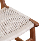 Close up image of a Dwaraka Akcacia wood chair with hand-woven cotton rope seat and backrest—an elegant piece of wooden seating and part of our artisan acacia wood chairs collection.