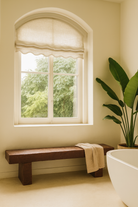 Lifestyle imagination of a rustic wood bench made of reclaimed wood, full block design, sustainable furniture for hallways, living rooms, or terraces, 200 × 30 × 40 cm.