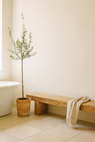 Lifestyle inspiration of a reclaimed teak wood bench with hand-carved details; rustic teak wood benches for dining, hallway, or bedroom use, 180 × 30 × 40 cm.