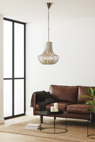 Lifestyle image of a large nickel-plated iron frame pendant light with pot-shaped silhouette – rustic style lighting ideal for kitchens, dining areas, and modern interiors.
