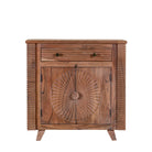 White background picture of a cupboard with carved  sunburst design made of acacia wood.