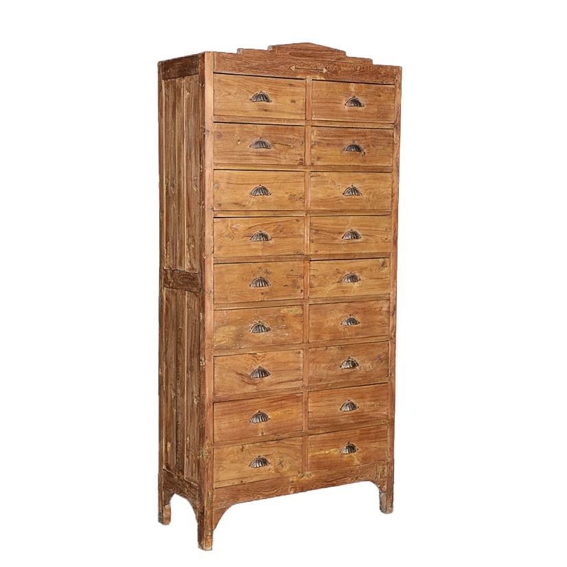 Side angle image of a tall teak wood furniture chest of drawers with 18 drawers and iron handles, in natural teak finish, 88 × 190 × 40 cm