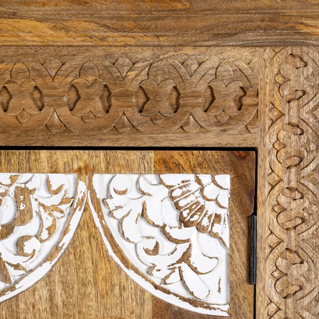 Close up image of a carved wood furniture wardrobe made from mango wood with whitewashed floral doors, wooden wardrobe in Ibiza-inspired style, 100 × 40 × 180 cm.