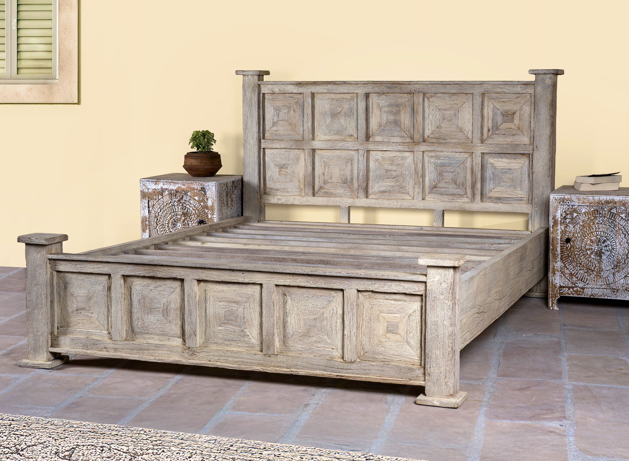 Wooden bed frame with panelled headboard and footboard, made of reclaimed wood in sandblasted Ibiza style, boho beds and bedroom furniture, 180 × 200 × 140 cm.
