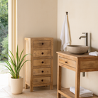 Lifestyle inspiration for a chest of 5 drawers made from reclaimed wood with rustic finish; Ibiza style sustainable furniture, 50 × 35 × 110 cm.