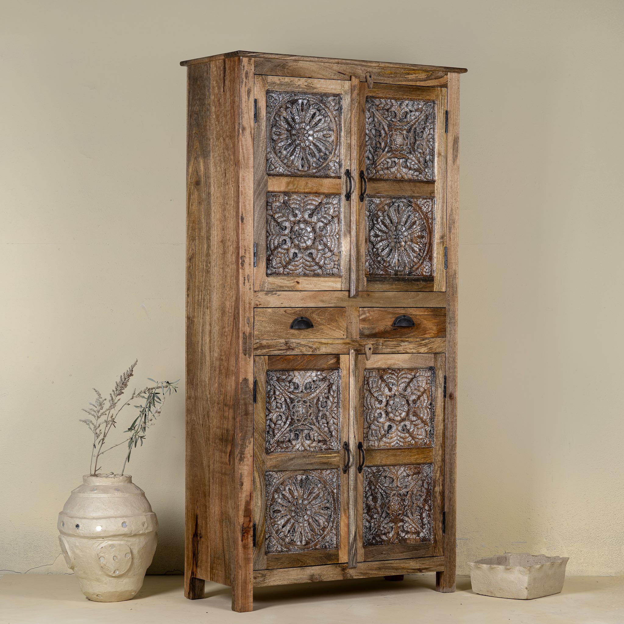 Side view of a Rustic elegant mango wood Cabinet with floral hand carvings, 4 doors and 2 drawers.