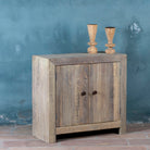 Side angle image of a Rustic cupboard made of reclaimed wood with two doors, sustainable bathroom furniture, 90 × 40 × 86 cm.