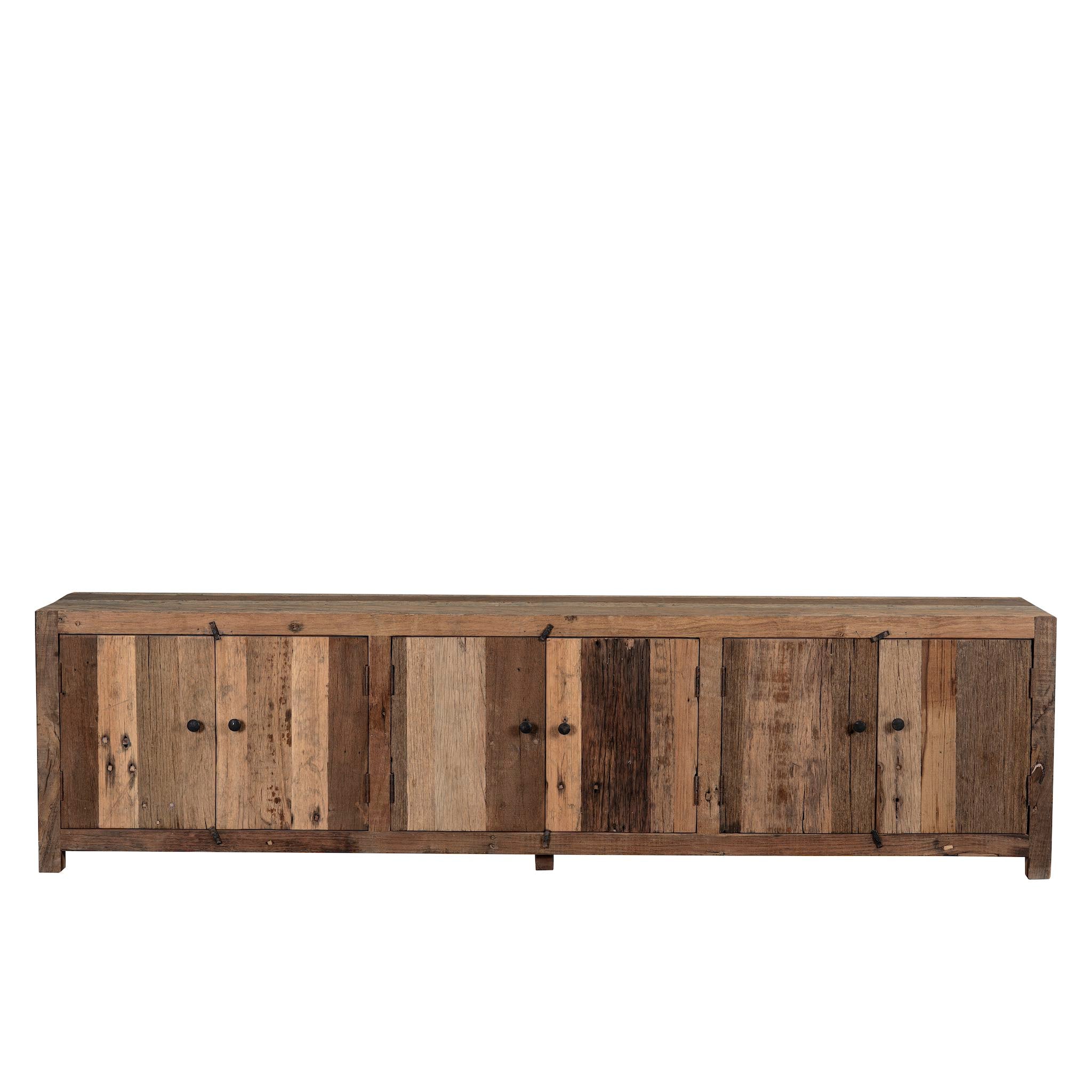 White background image of a sustainable driftwood furniture lowboard made from reclaimed wood with four cabinets and rustic finish; 230 × 45 × 60 cm.