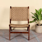 Acacia wood chair with handwoven cotton rope seat and backrest; rustic wooden armchair for living rooms or lounges, 60 × 80 × 95 cm.