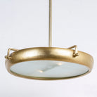 Side angle image of a extra-large round pendant lamp with clear glass and brass-plated iron frame – retro lighting and artsy lamp ideal for kitchens, dining rooms, or open living spaces.