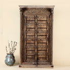 Mahika cabinet with antique carved teak door, part of our teak wood furniture collection, perfect for a bohemian interior.