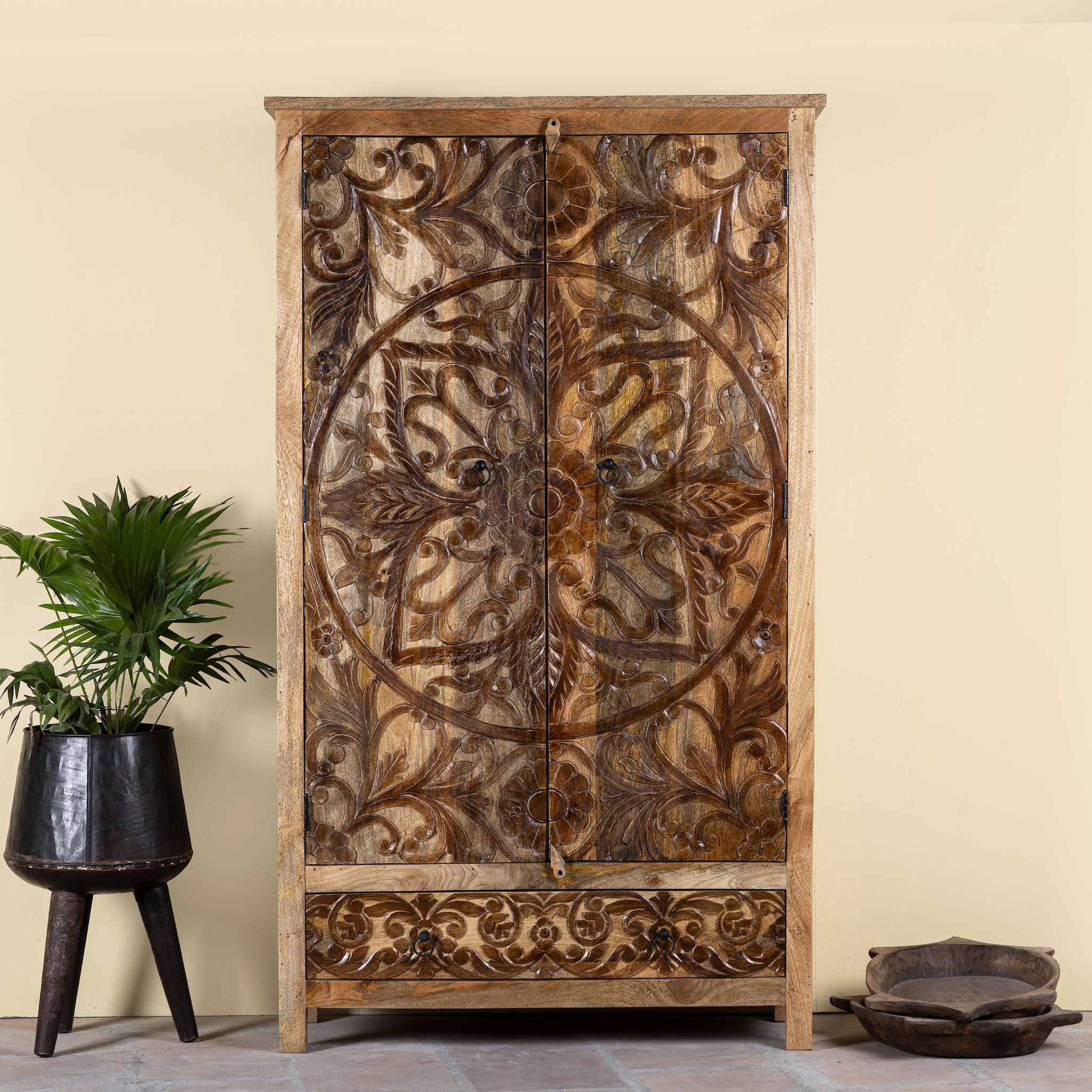 Hand-carved mango wood wardrobe, a unique wooden furniture piece inspired by traditional Indian furniture craftsmanship.