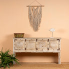 Reclaimed teak wood console table with hand-carved floral fronts and iron accents; sustainable furniture, 153 × 80 × 40 cm.