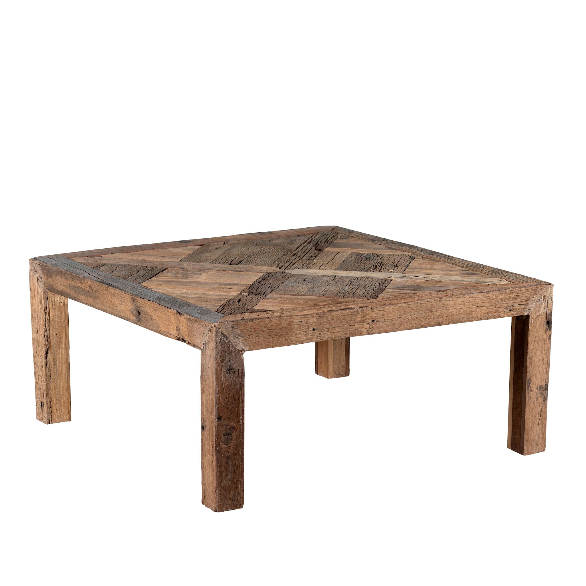 White background image of a square rustic coffee table made from reclaimed wood, featuring a patterned plank tabletop with a natural distressed finish and sturdy block legs for a solid, handcrafted look.