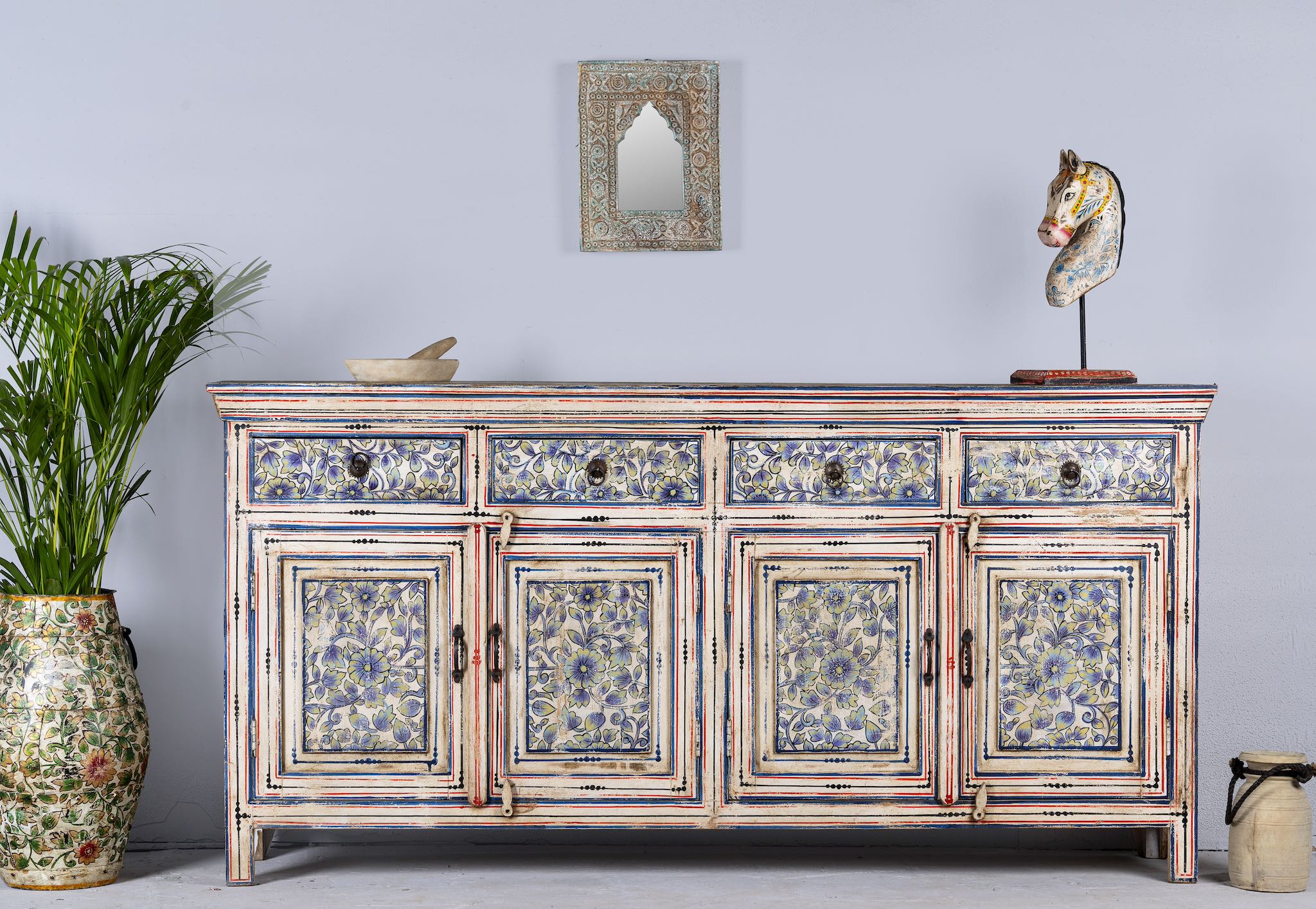 Vintage hand-painted floral sideboard with reclaimed wood frame, blue and yellow floral designs, and distressed multicolour detailing.