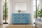Lifestyle imagination of a hand-painted chest of drawers made of reclaimed wood in blue and white – Nitara model by Om Home & Garden