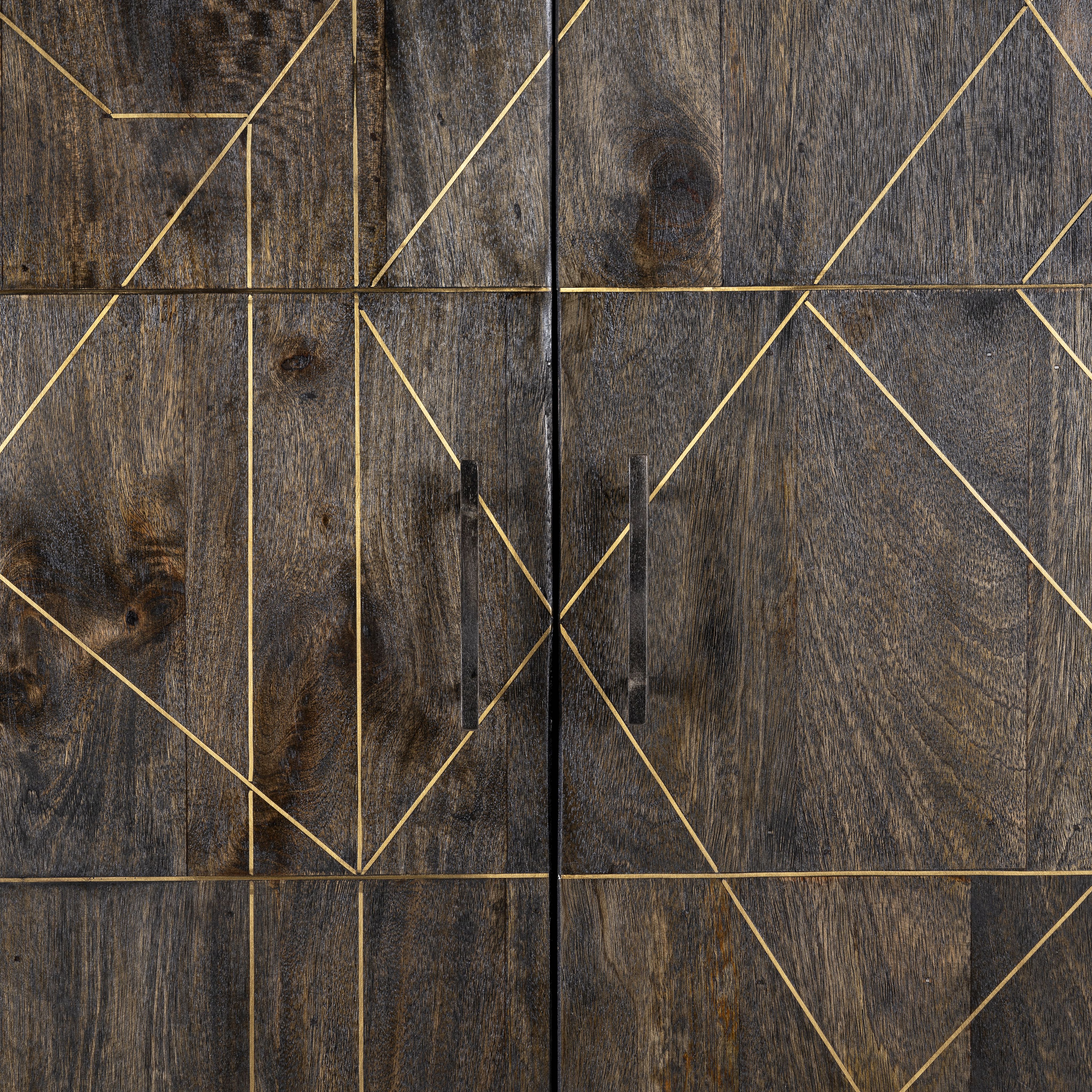 Close up image of a black wooden cabinet with handcrafted copper inlays and nickel-plated metal base—an artisanal furniture piece with a refined minimalistic style.