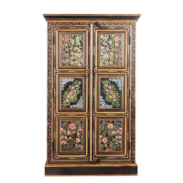 White background image of a hand-painted cabinet made from recycled wood with floral motifs – sustainable furniture and unique furniture for bold, artistic interiors.