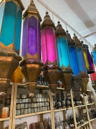 Tall oriental pendant lamp Ovin made from punched metal and coloured Belgium glass – 100 cm hanging lantern in red, yellow, white, and blue for vibrant atmospheric lighting.