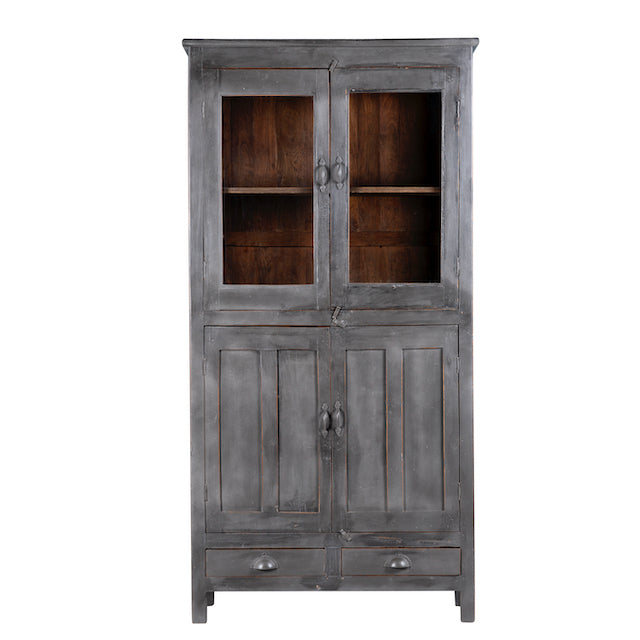 White background image of a shabby chic grey teak wood cabinet with glass doors and drawers – sustainable furniture for classic, rustic, or vintage interiors.