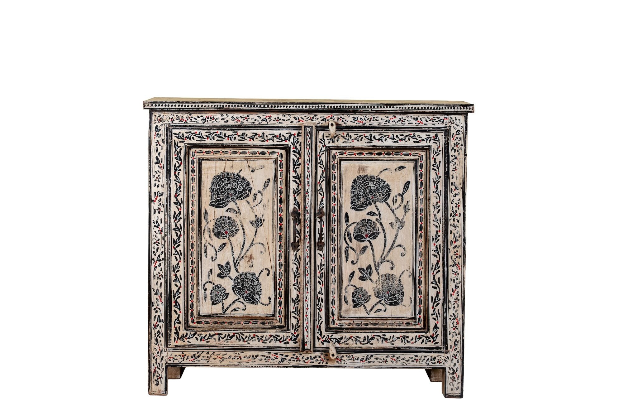 White background image of a hand-painted cupboard made from reclaimed wood with Indian floral motifs; ideal for boho chic living room or unique furniture decor, 100 × 92 × 36 cm.