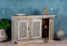 Side angle image with open door of a hand-painted sideboard made from reclaimed wood in indigo and cream tones – a handcrafted piece of reclaimed wood furniture perfect for hand painted interiors.