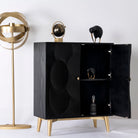 Side angle image with open doors of a black mango wood cabinet with carved circular patterns and brass-plated iron base, 91 × 43 × 111 cm.