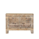 White background image of a sideboard Taksh made from reclaimed teak wood, featuring carved antique Indian door fronts with circular mandala motifs. A unique piece of old door furniture combining Mediterranean style with traditional Indian craftsmanship.