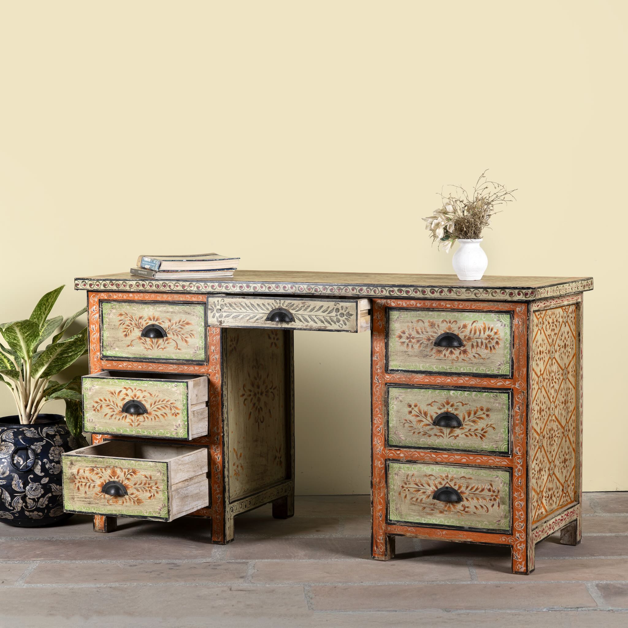 Side angle image with open drawers of a hand-painted desk made of reclaimed wood with floral detailing – Tejasvini model by Om Home & Garden