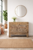 Lifestyle imagination of a reclaimed wood sideboard made from antique teak doors with carved detailing; teak furniture, 110 × 45 × 83 cm.