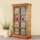 Side angle image of a hand painted teak wood cabinet with floral motifs, restored Indian furniture online; unique storage piece, 100 × 44 × 185 cm.