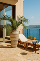 Lifestyle image of a hand-painted iron floor vase with Sanskrit motifs – a one-of-a-kind painted iron decoration perfect for bohemian interior styling.