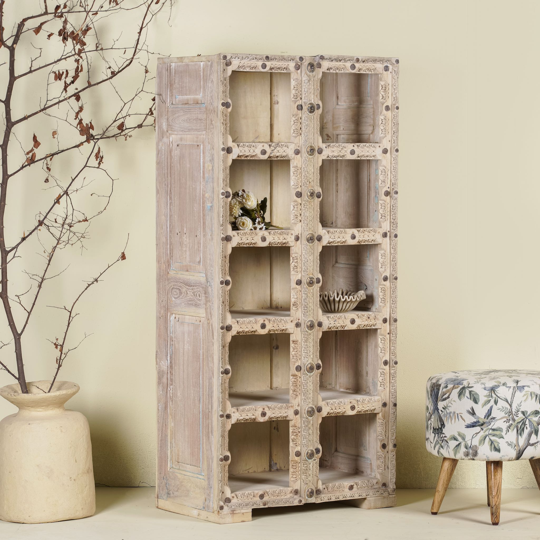 Side angle image of a reclaimed teak wood shelving unit with 10 compartments and iron fittings – sustainable furniture combining practicality, style, and handcrafted quality.