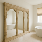 Lifestyle imagination of a triple-arched antique teak wall mirror from our vintage mirrors collection, a statement piece of unique wooden furniture.