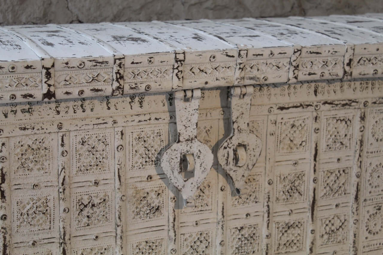 Close up image of a antique Indian chest in blue with brass fittings – solid teak iron fitted wooden chest ideal for storing blankets, pillows, or decorative use.