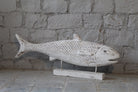 Hand-carved fish sculpture made from reclaimed teak wood – a vintage home decor piece ideal for coastal and living room decoration.