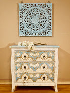 Boho style carved drawer chest made from solid mango wood with floral hand-carved details, Mediterranean design, 80 × 75 × 35 cm.
