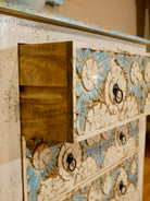 Boho style carved drawer chest made from solid mango wood with floral hand-carved details, Mediterranean design, 80 × 75 × 35 cm.