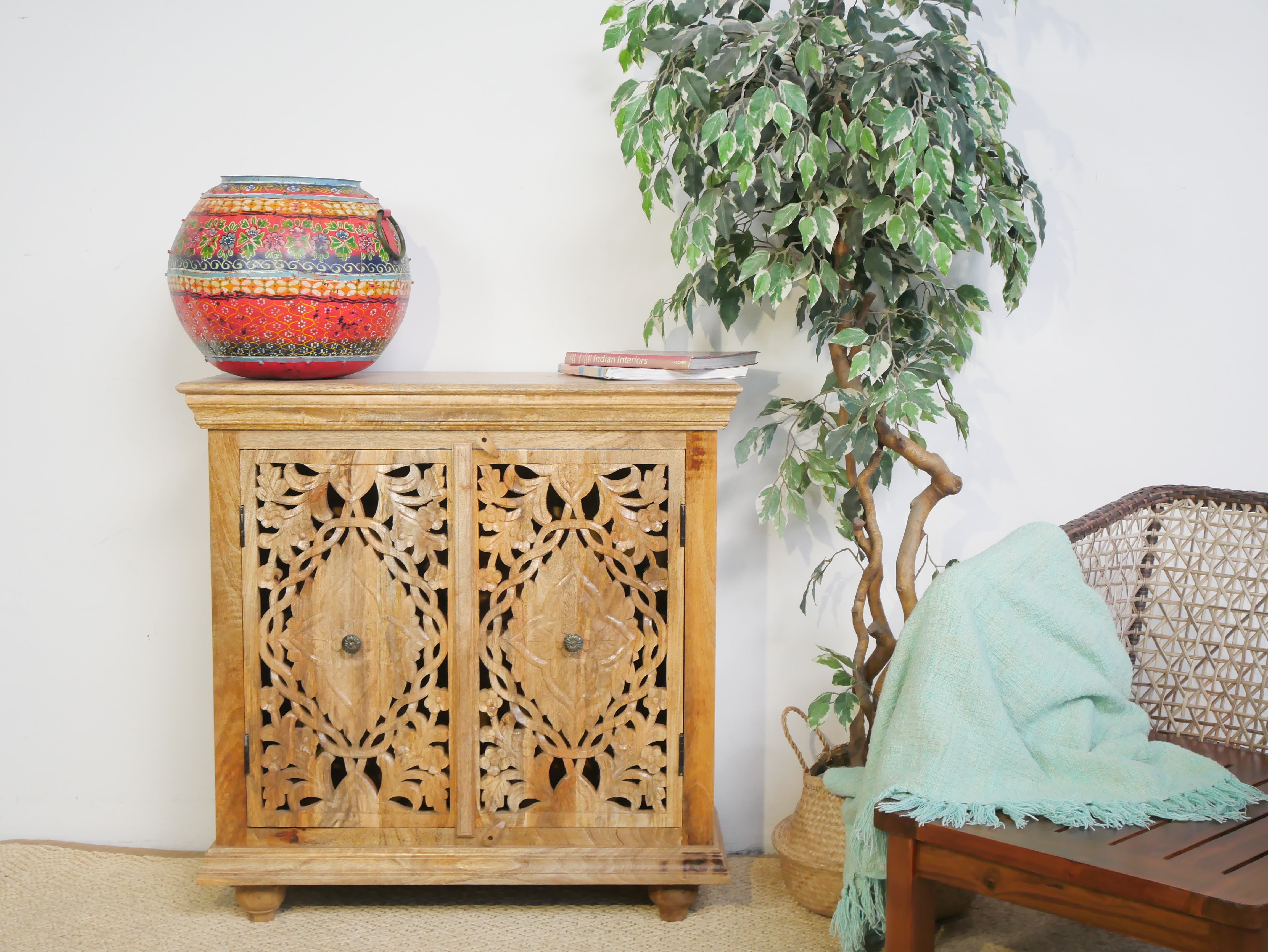 Carved wood furniture cupboard in solid mango wood with handmade floral carvings, Mediterranean-style, 90 × 90 × 40 cm.
