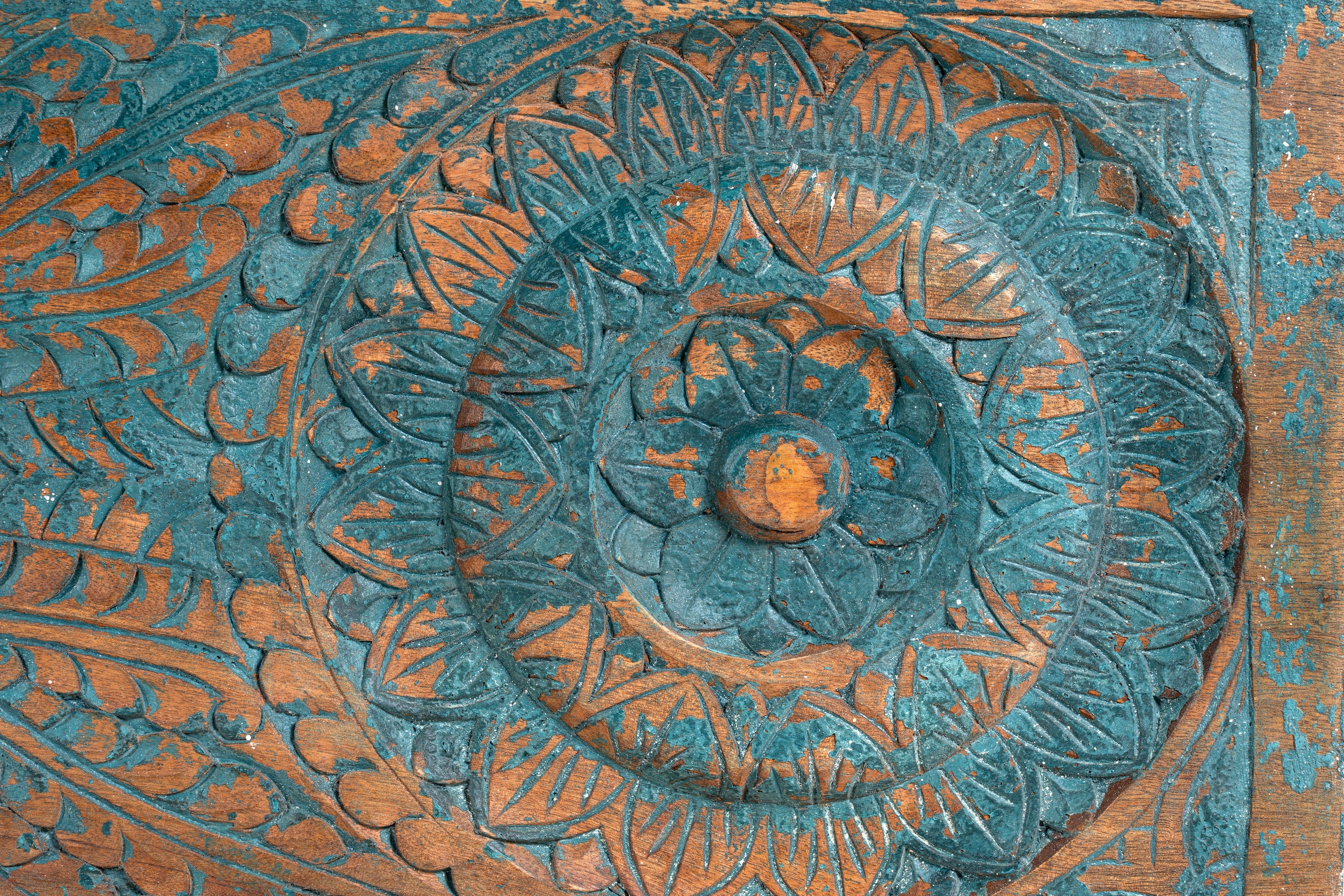 Close up image of a mediterranean-style mango wood chest with natural finish – vintage style furniture ideal as a coffee table or TV stand with storage.