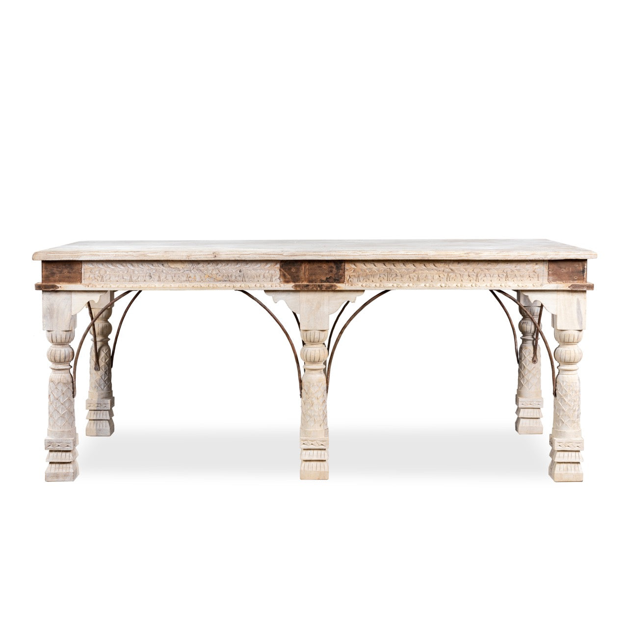 White background image of a teak wood dining table with six hand-carved pillar legs; reclaimed Indian dining table, 180 × 90 × 75 cm.