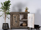 Open door image of a hand-painted cupboard made from reclaimed wood with Indian floral motifs; ideal for boho chic living room or unique furniture decor, 100 × 92 × 36 cm.